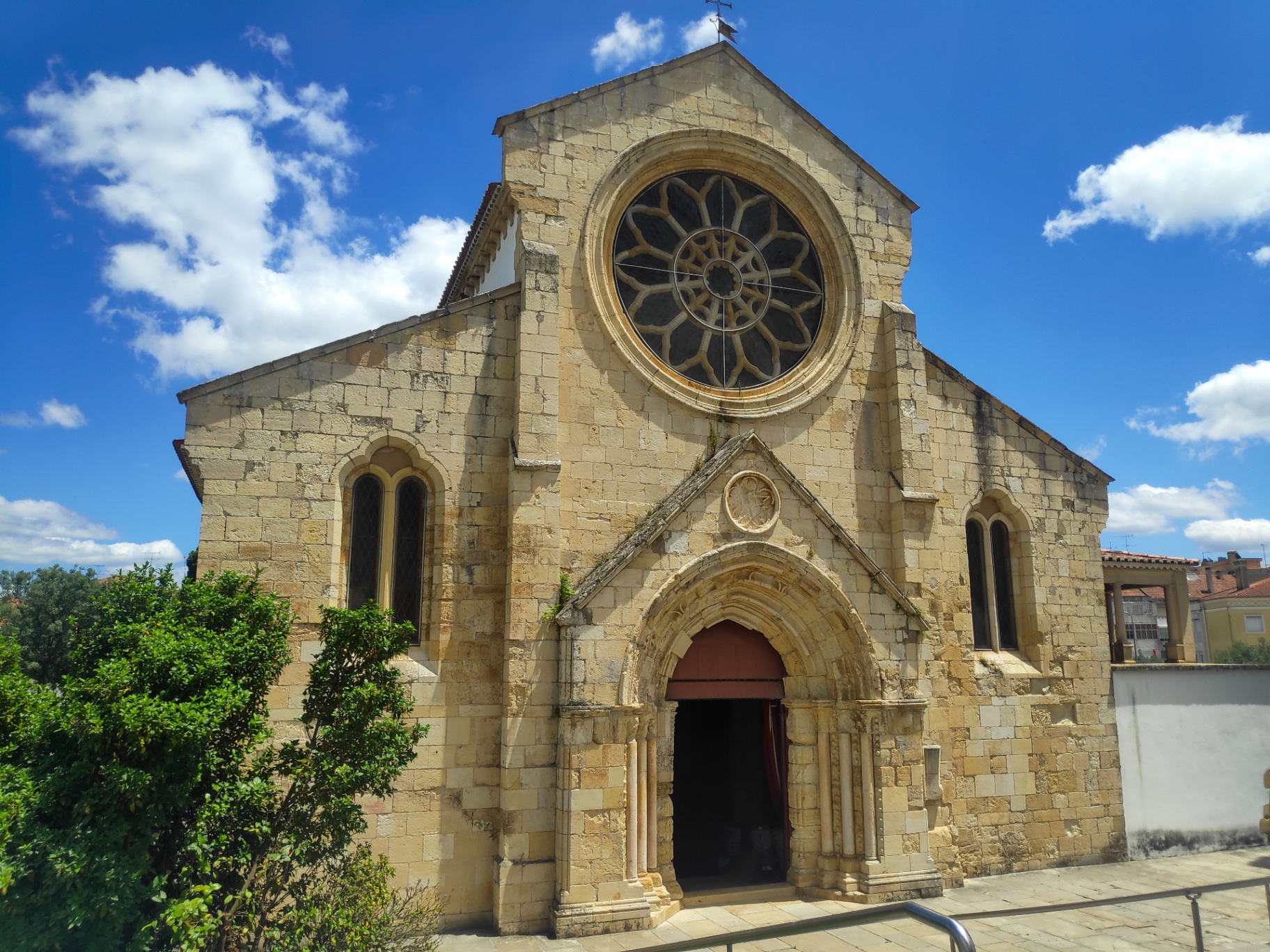 Romanesque façade of the Church of Santa Maria do Olival in Tomar, with its rose window