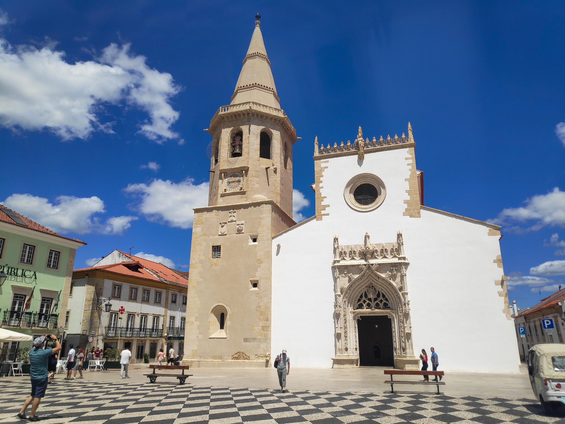The cobbled Praça da República in Tomar, with the Church of São João Baptista and its bell tower